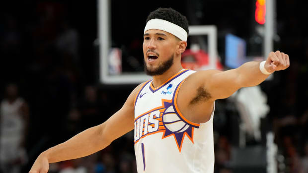 Phoenix Suns guard Devin Booker calls out a play against the Portland Trail Blazers.